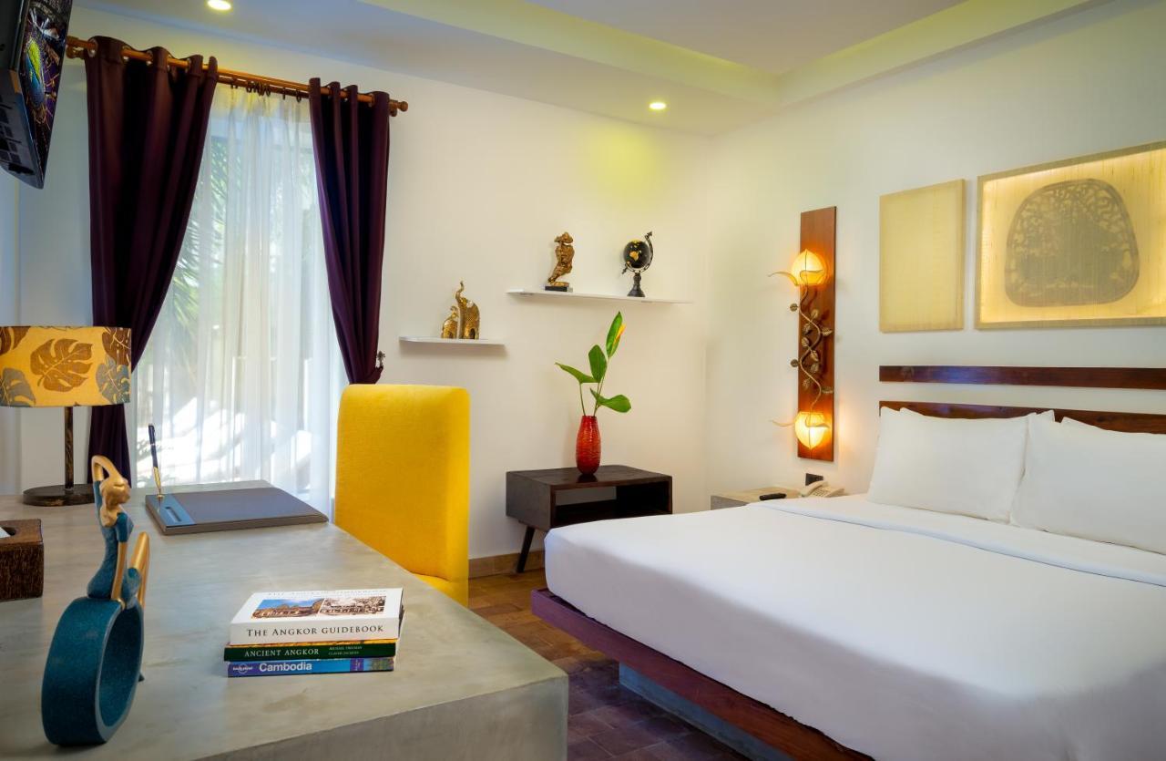 The Thirdfold Residence Siem Reap Extérieur photo A room at the hotel